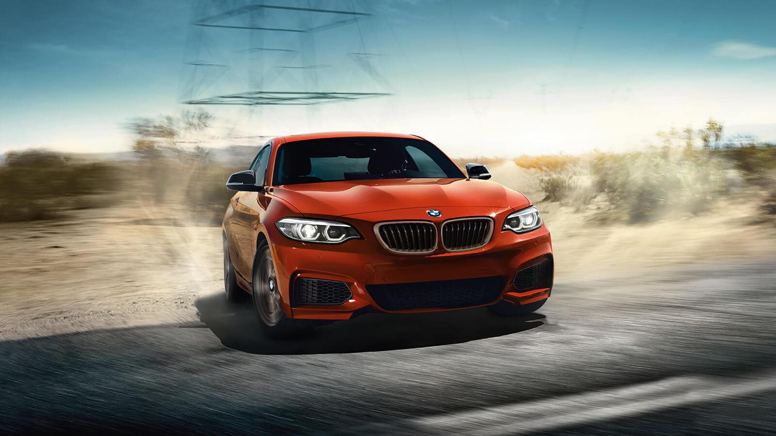 2019 BMW 230i Front Orange Driving Exterior 2019 BMW 230i Front Orange Driving Exterior